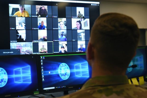 Airmen in a tele-conference call